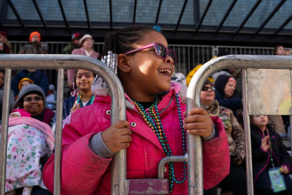 Kamryn Leflore, 6, of Detroit, reacts as performers and floats approach during the 96th America’s Thanksgiving Parade along Woodward Avenue in downtown Detroit on Thursday, Nov. 24, 2022.