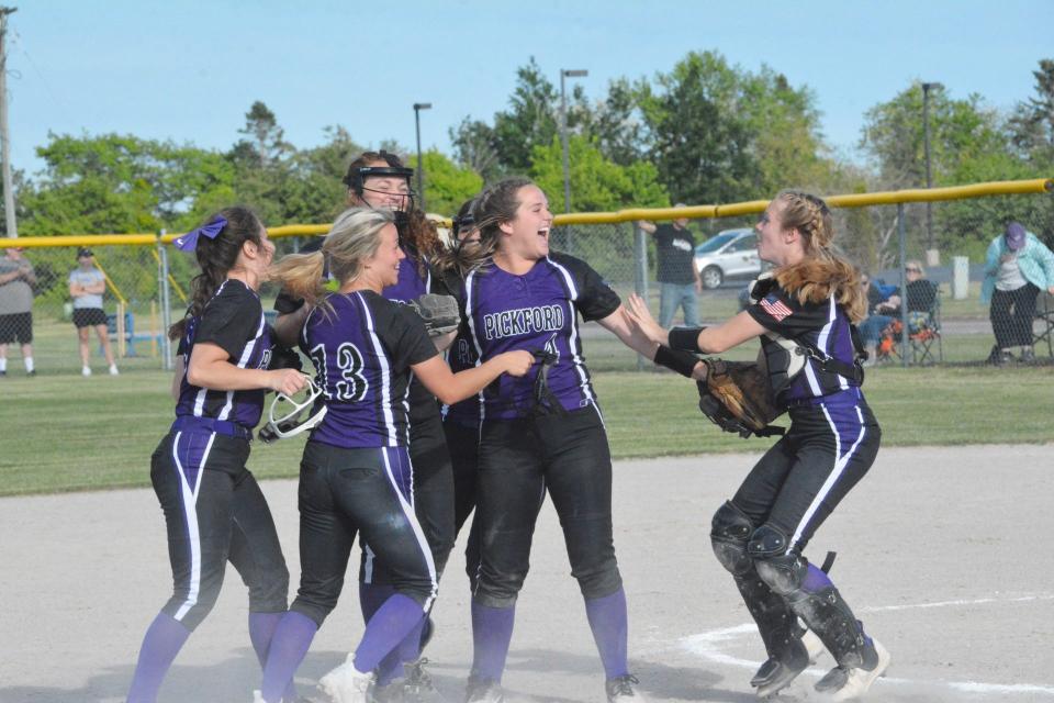 Pickford softball players celebrate after beating Hillman 5-4 in a Division 4 quarterfinal at Locey Field in Sault Ste. Marie Tuesday.