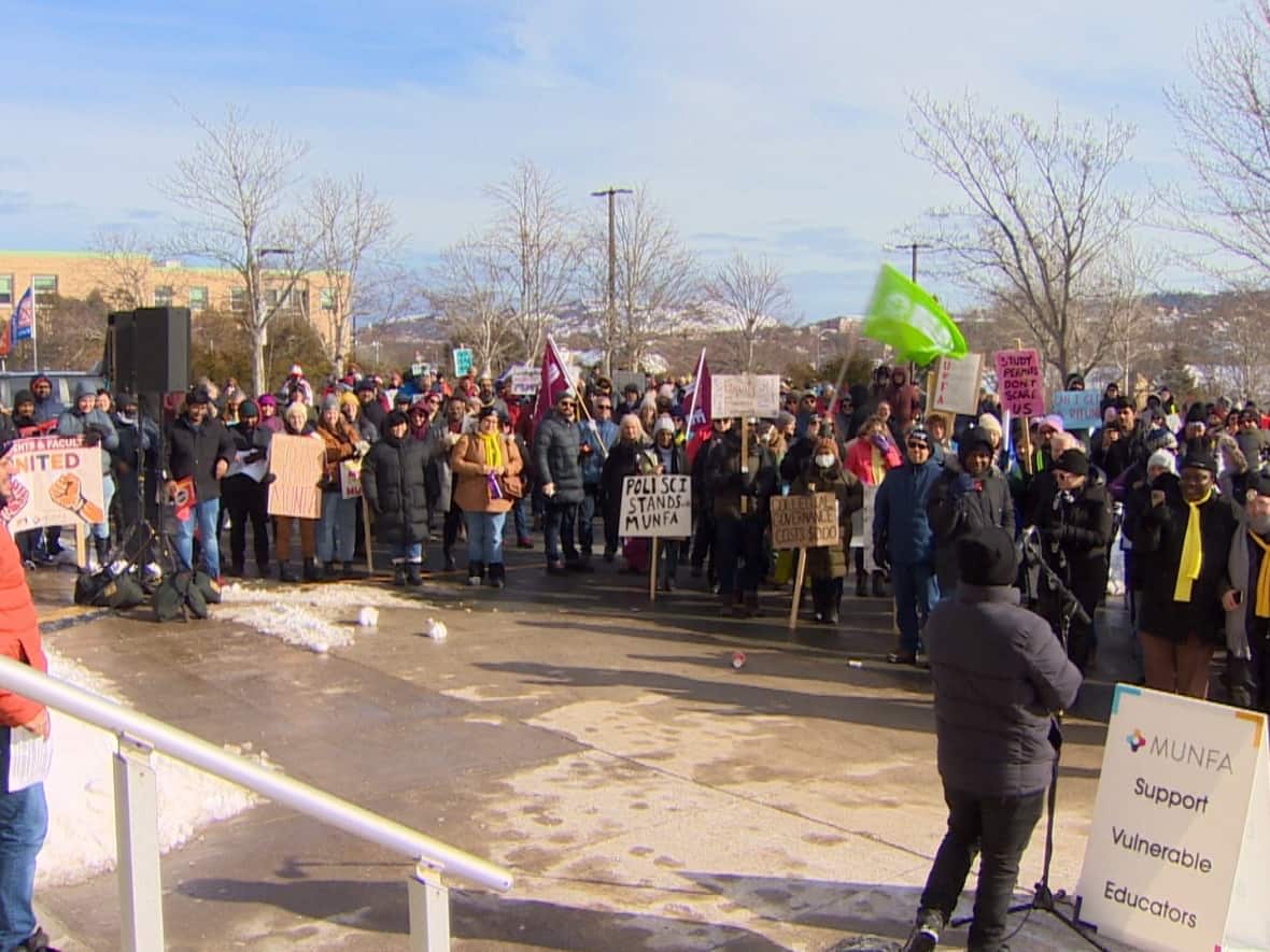 Members of the Memorial University of Newfoundland Faculty Association rallied Friday as the union approached the end of its second week on strike.  (Curtis Hicks/CBC - image credit)