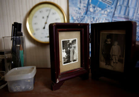 Katsuo Saito's old family photographs are displayed in his room in Tokyo, Japan, September 7, 2017. REUTERS/Kim Kyung-Hoon