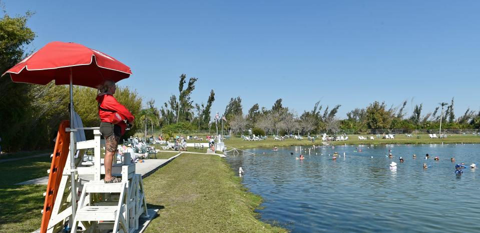 Lead lifeguard, Lexi Christian keeps a watchful eye over the springs bathers at Warm Mineral Springs Park, located at 12200 San Servando Ave, in Sarasota County's North Port.