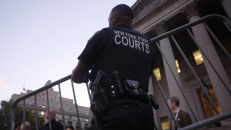 Court police prepare for the arrival of former President Donald Trump to New York State Supreme court for the start of the civil fraud trial against him on October 02, 2023 in New York City. Trump and his associates are being charged with inflating assets in fraudulent financial statements. A ruling last week by a judge determined that Trump and his co-defendants are liable for “persistent and repeated” fraud.