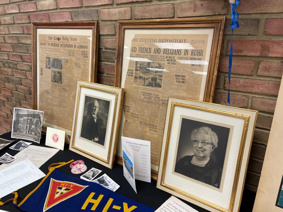 Newspaper clippings and photos of H. William "Boss" Hoover and Mary Hoover Price were on display at the YMCA's 100th anniversary event.
