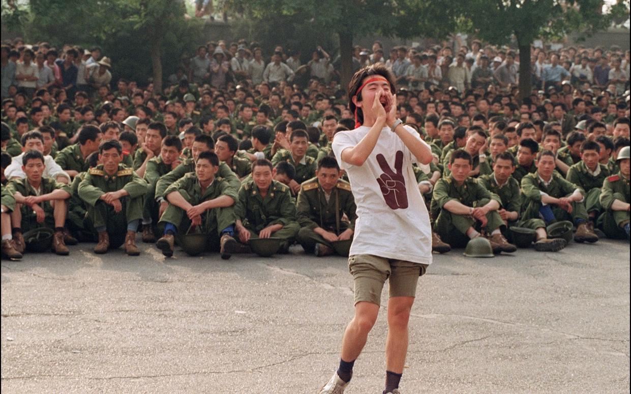 Tiananmen Square sheltered the last pro-democracy supporters as Chinese troops marched on the square in 1989 - AFP