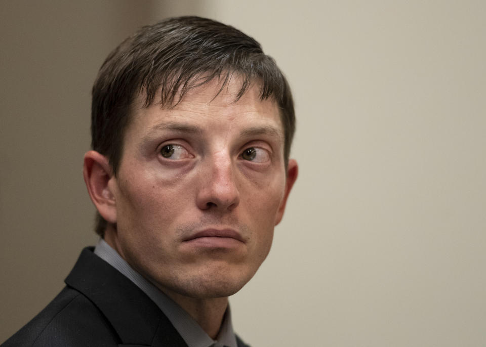 Ex-Grand Rapids police officer Christopher Schurr appears for a court hearing at the Kent County Courthouse in Grand Rapids, Mich. on Thursday, Oct. 26, 2022. Schurr is charged with second-degree murder for fatally shooting Black motorist Patrick Lyoya in the back of the head on April 4. (Cory Morse/The Grand Rapids Press via AP)