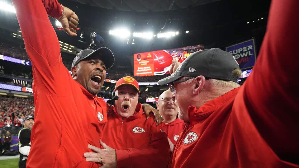 Andy Reid (middle) celebrates with his coaches after winning Super Bowl LVIII. - Julio Cortez/AP