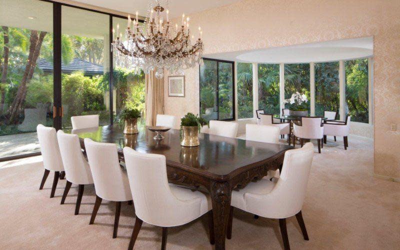 <p>The formal dining room can seat 9-people comfortably and looks out onto the garden.</p>