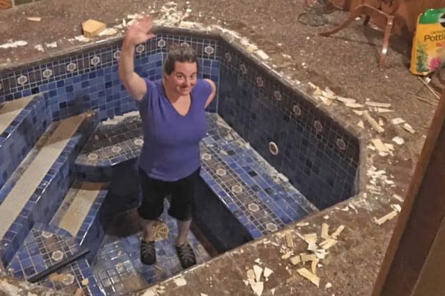 Couple uncover stunning bath under the floor of their home office