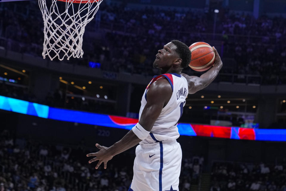 U.S. guard Anthony Edwards (10) get a dunk against Jordan during the second half of a Basketball World Cup group C match in Manila, Philippines Wednesday, Aug. 30, 2023. (AP Photo/Michael Conroy)