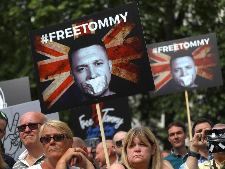 Robinson’s supporters demonstrate in London earlier this month (Reuters)