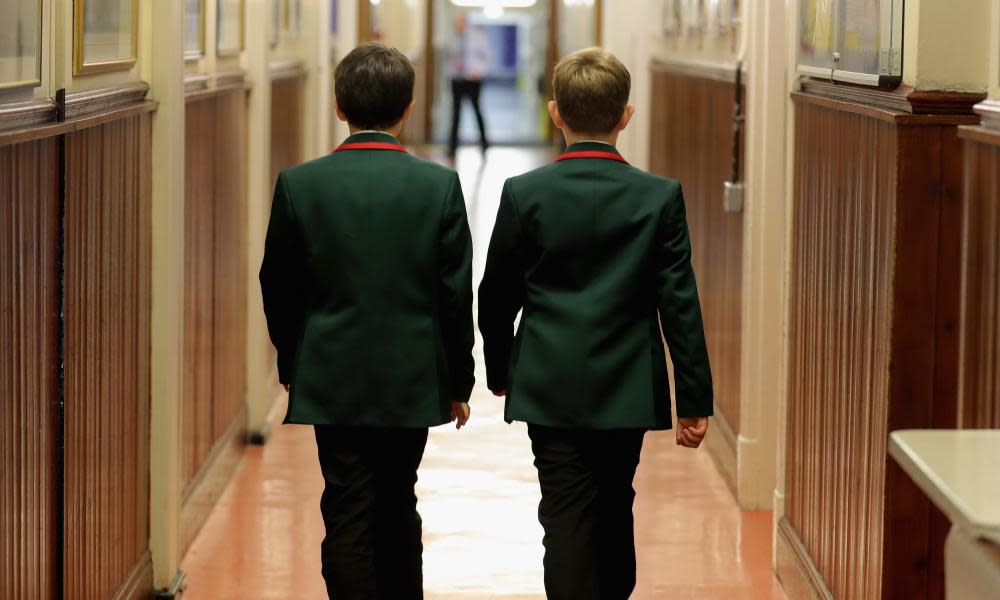 Schoolboys make their way to class at Altrincham Grammar School for Boys.