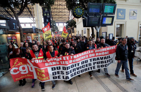 Railway workers demonstrate inside the Gare Saint-Charles train station on the second day of a nationwide strike by French SNCF railway workers, in Marseille, France, April 4, 2018. REUTERS/Jean-Paul Pelissier