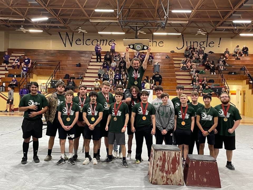 South Terrebonne powerlifter Cody Pellegrin (top row) is held up by teammates after winning the Battle on the Bayou Invitational powerlifting meet on Jan. 22.