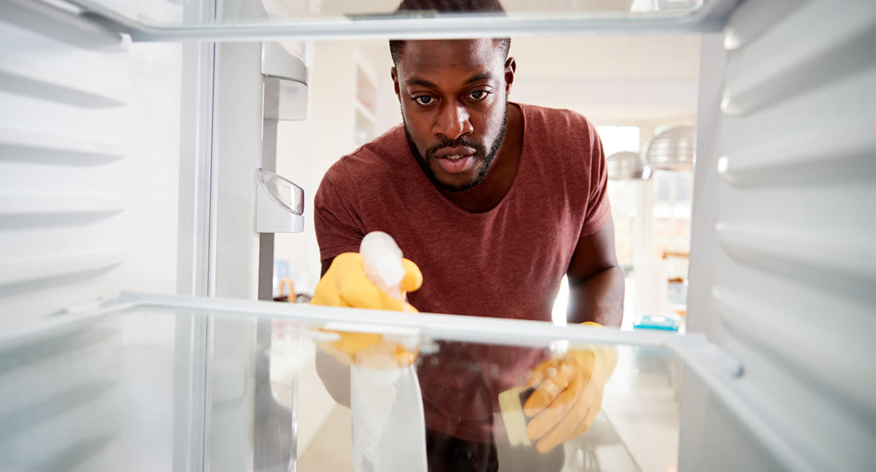 Cleaning the fridge before holiday. (Getty Images)