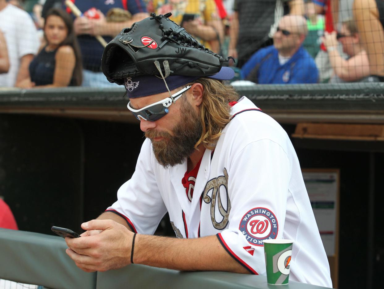 Jayson Werth of the Louisville Stars checks his phone before the start of the championship game in the 2018 Bluegrass World Series at Louisville Slugger Field in Louisville. Werth is now a part owner of 2024 Kentucky Derby contender Dornoch.