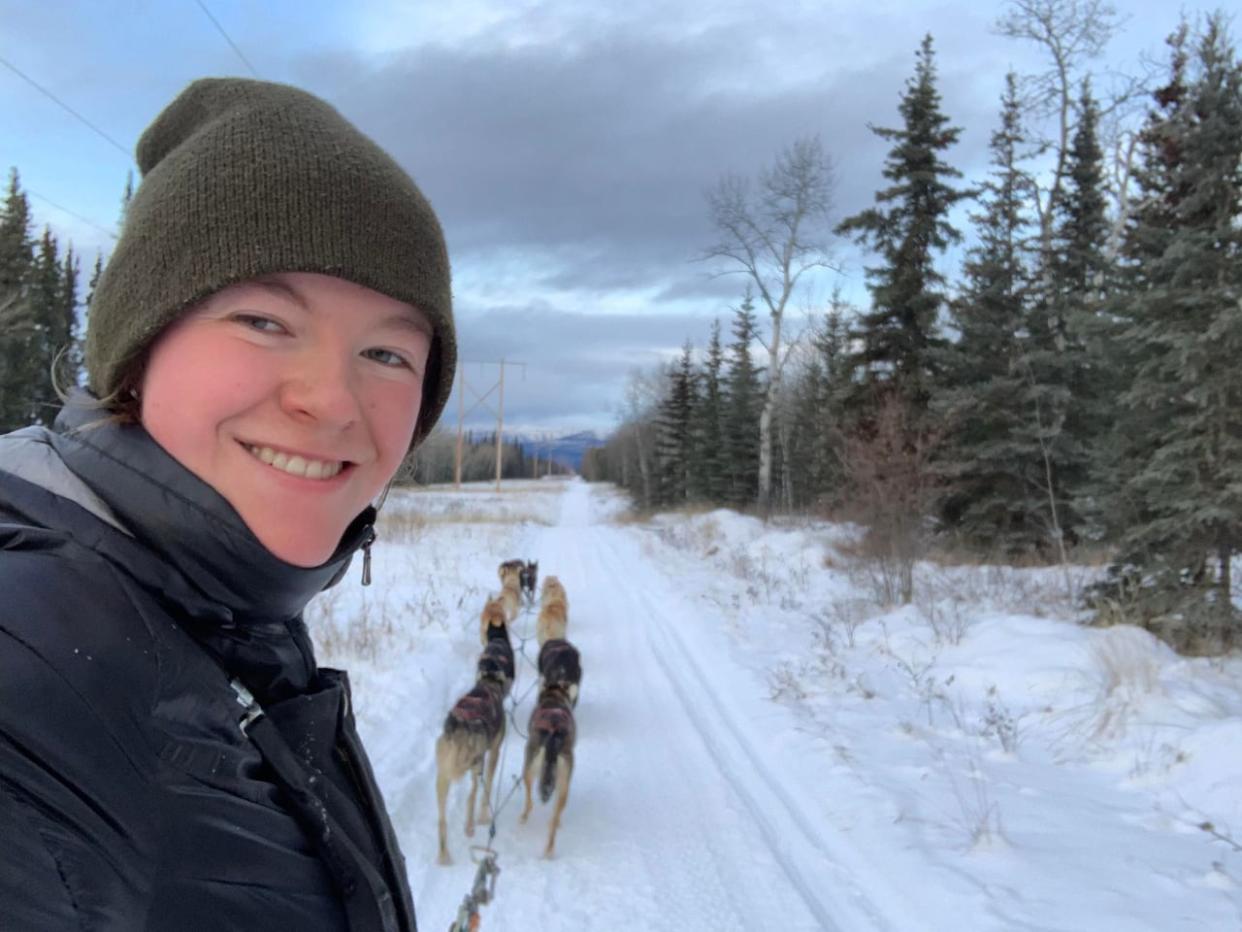 Yukoner Louve Tweddell grew up watching their father compete in the Yukon Quest 1000, between Whitehorse and Fairbanks, Alaska. Tweddell is competing this year in the Yukon Quest 250, from Whitehorse to Pelly Crossing, Yukon. (Submitted by Louve Tweddell - image credit)