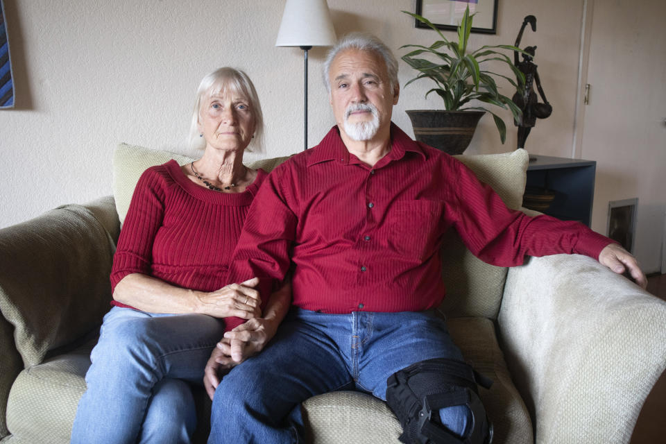 Jeff Woodke, and his wife, Els, pose for a photo at their home in McKinleyville, Calif., Monday, June 5, 2023. American missionary Jeff Woodke was taken by Islamic extremists in Niger and held in captivity for six-and-a-half years. Woodke and his wife, Els, recently spoke to The Associated Press in their first joint interview, sharing previously unreported details about his captivity and their frustrating interactions with the U.S government. (AP Photo/Shaun Walker)