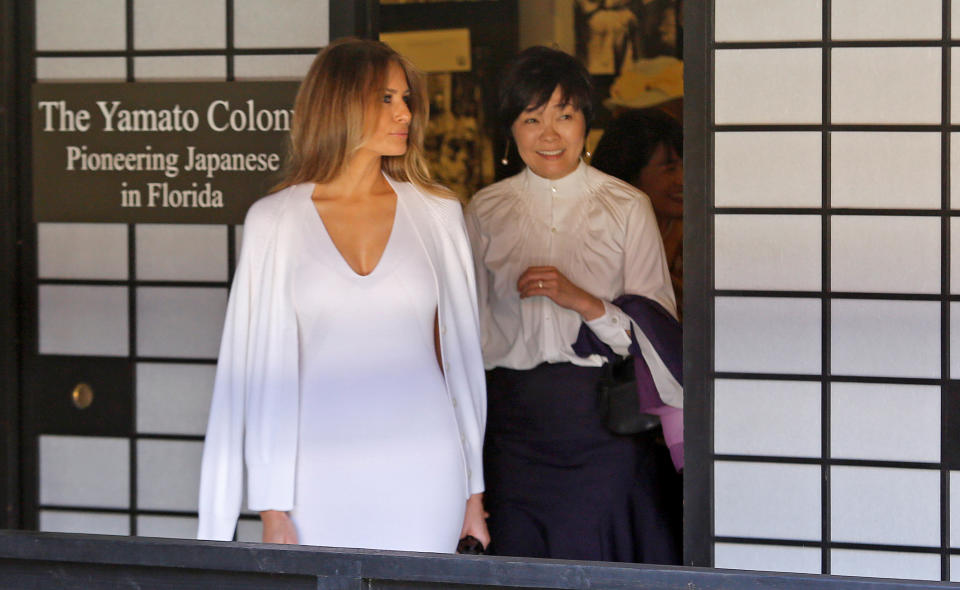 U.S. First Lady Melania Trump (L) and Akie Abe, wife of Japanese Prime Minister Shinzo Abe, tour Morikami Museum and Japanese Gardens in Delray Beach, Florida, U.S., February 11, 2017. REUTERS/Joe Skipper