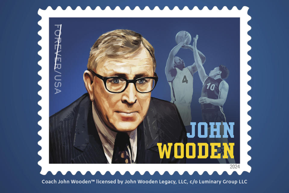 This undated image provided by University of California Los Angeles shows a shows a newly released by the US Postal Service a stamp of UCLA coach John Wooden. The U.S. Postal Service unveils a stamp for John Wooden, who coached UCLA to a record 10 national basketball championships, outside Pauley Pavilion on the first day of issue, Saturday, Feb. 24, 2024. (US Postal Service/UCLA via AP)