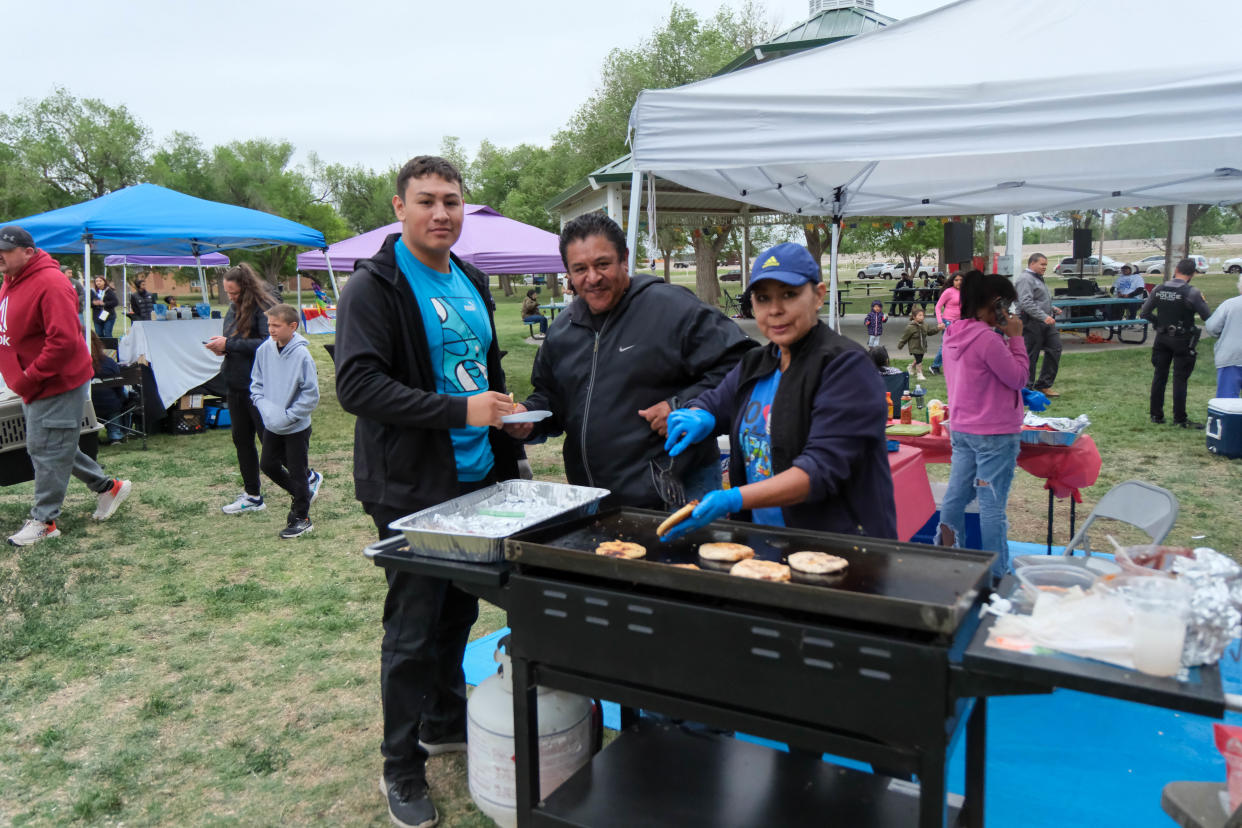 Vendors prepare food Saturday at the El Barrio Lions Club annual Cinco de Mayo Celebration at Alamo Park in Amarillo.
