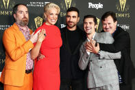 <p>Brendan Hunt, Hannah Waddingham, Brett Goldstein, Phil Dunster and Jeremy Swift celebrate <em>Ted Lasso</em> at the Television Academy's Reception to Honor 73rd Emmy Award Nominees on Sept. 17 in Los Angeles.</p>