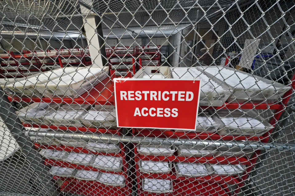 A portion of mail-in and absentee ballots that have arrived at the Allegheny County Election Division are kept in a secure area at the Elections warehouse in Pittsburgh, Thursday, Oct. 29, 2020. (Gene J. Puskar/AP)