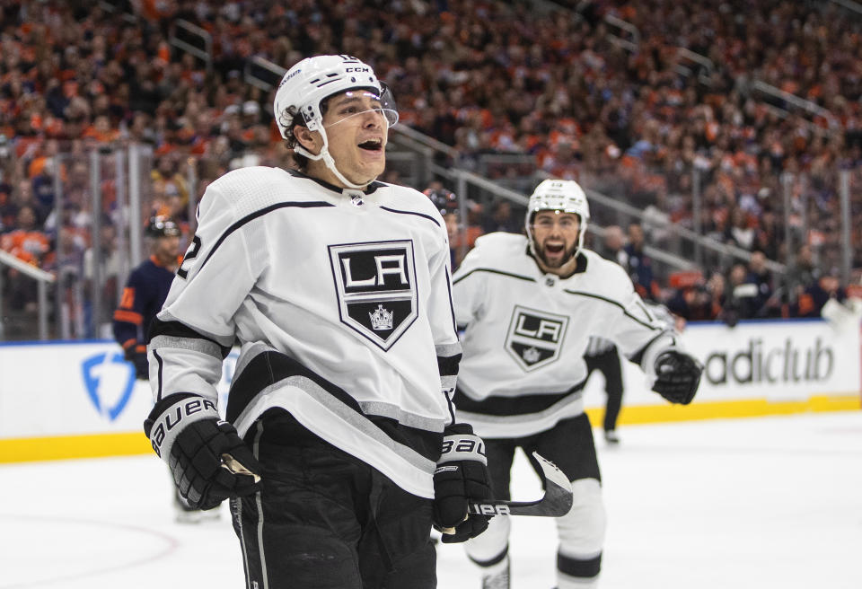 Los Angeles Kings' Trevor Moore (12) celebrates a goal against the Edmonton Oilers during the first period of Game 1 of an NHL hockey Stanley Cup first-round playoff series, Monday, May 2, 2022 in Edmonton, Alberta. (Jason Franson/The Canadian Press via AP)