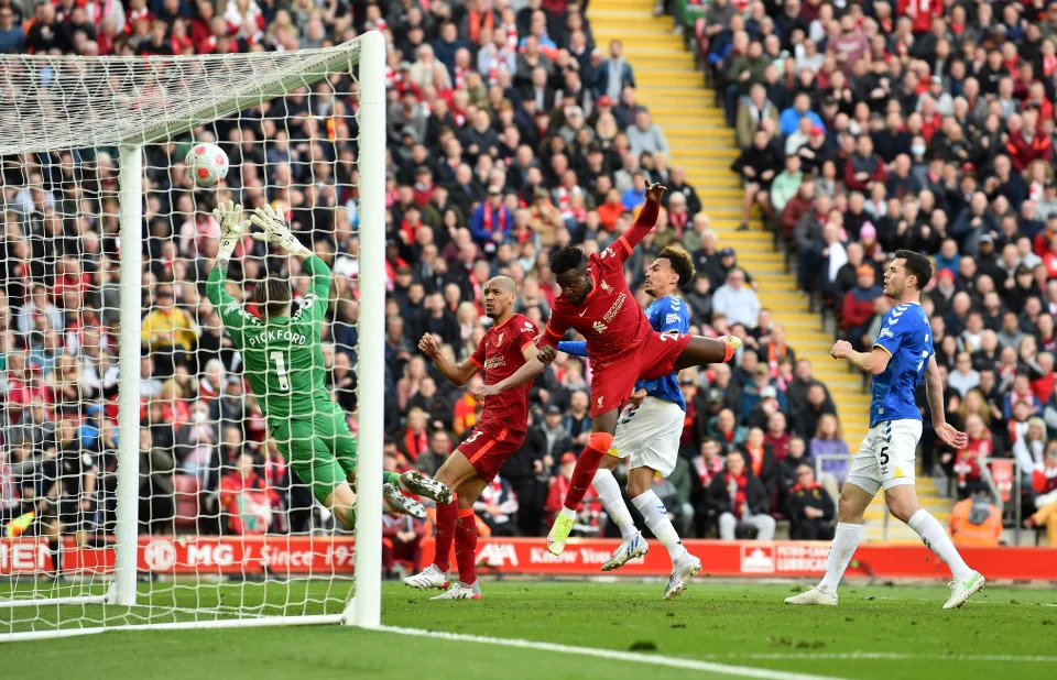 LIVERPOOL, ENGLAND - APRIL 24: (THE SUN OUT, THE SUN ON SUNDAY OUT) Divock Origi of Liverpool scoring the second goal making the score 2-0 during the Premier League match between Liverpool and Everton at Anfield on April 24, 2022 in Liverpool, England. (Photo by Andrew Powell/Liverpool FC via Getty Images)