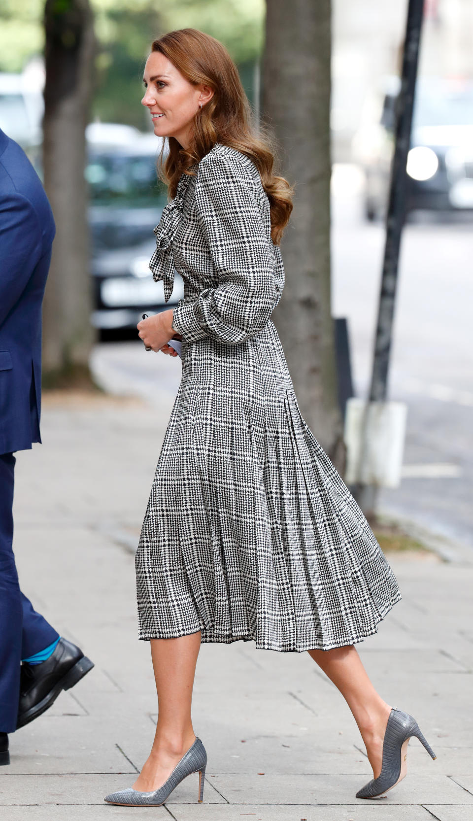 The Duchess of Cambridge wears a pleated monochrome midi from Zara as she visits University College London's Centre for Longitudinal Studies to meet with early years researchers on 5 October 2021. (Max Mumby/Indigo/Getty Images)