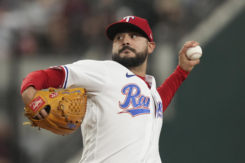 Texas Rangers starting pitcher Martin Perez throws during the first inning of a baseball game against the Detroit Tigers in Arlington, Texas, Tuesday, June 27, 2023. (AP Photo/LM Otero)