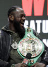 Deontay Wilder laughs during a news conference for his upcoming WBC heavyweight championship boxing match against Tyson Fury, of England, Wednesday, Feb. 19, 2020, in Las Vegas. (AP Photo/Isaac Brekken)