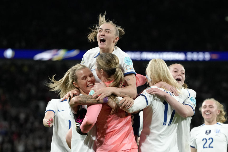 England players celebrate after defeating Brazil 4-2 in a penalty shootout at the end of the Women's Finalissima soccer match between England and Brazil at Wembley stadium in London, Thursday, April 6, 2023. The match had ended tied 1-1. (AP Photo/Kirsty Wigglesworth)
