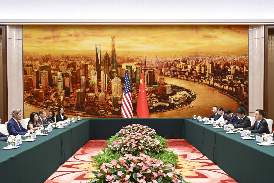 In this photo released by Xinhua News Agency, U.S. Special Presidential Envoy for Climate John Kerry, left, meets with Chinese Vice President Han Zheng, right, in Beijing, Wednesday, July 19, 2023. China is willing to work with Washington on reducing global warming as long as its political demands are met, the country's vice president told U.S. climate envoy John Kerry on Wednesday. (Zhang Ling/Xinhua via AP)