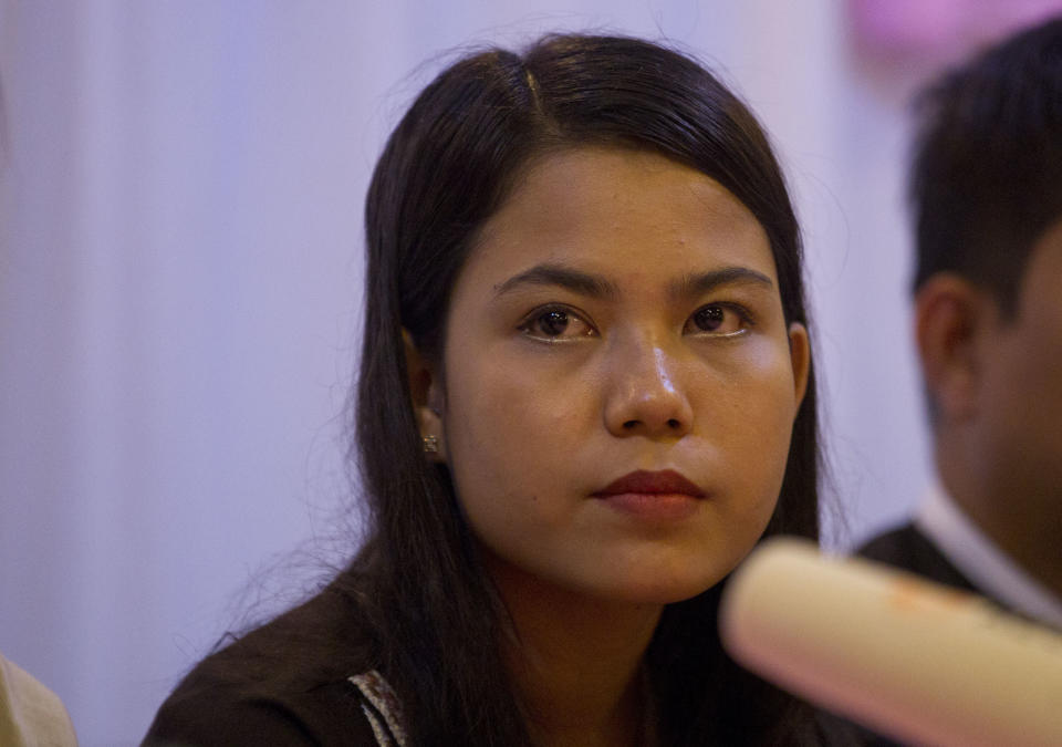 Chit Su Win, wife of Reuters journalist Kyaw Soe Oo, listens to questions during a press briefing at a hotel Tuesday, Sept. 4, 2018, in Yangon, Myanmar. A Myanmar court sentenced two Reuters journalists to seven years in prison Monday on charges of illegal possession of official documents, a ruling met with international condemnation that will add to outrage over the military’s human rights abuses against Rohingya Muslims. (AP Photo/Thein Zaw)