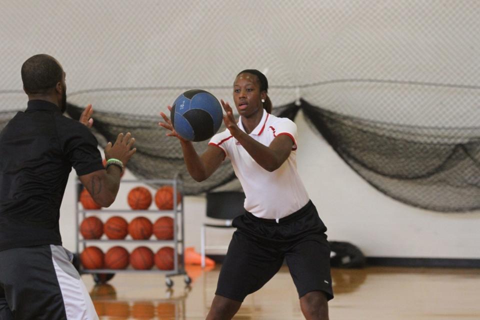 Shawnta' and Shawn Dyer lead an adult fitness class for "Live Again" at Marion Harding High School in the summer of 2015. Both are part of the 30th induction class for the Marion Harding High School Athletic Hall of Fame.