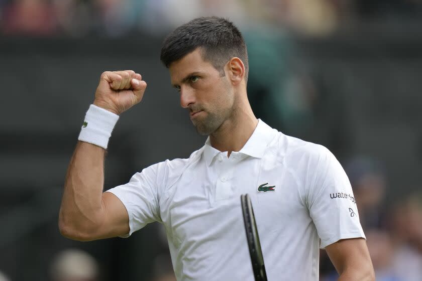 Serbia's Novak Djokovic after winning the second set from Australia's Jordan Thompson during the men's singles match on day three of the Wimbledon tennis championships in London, Wednesday, July 5, 2023. (AP Photo/Alastair Grant)