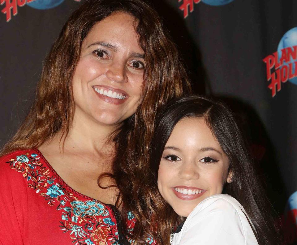 <p>Bruce Glikas/Bruce Glikas/FilmMagic</p> Jenna Ortega poses with her mom as she promotes Disney