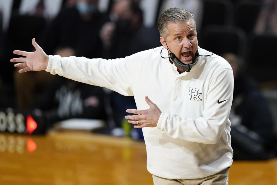 Kentucky head coach John Calipari argues a call in the first half of an NCAA college basketball game against Vanderbilt Wednesday, Feb. 17, 2021, in Nashville, Tenn. (AP Photo/Mark Humphrey)