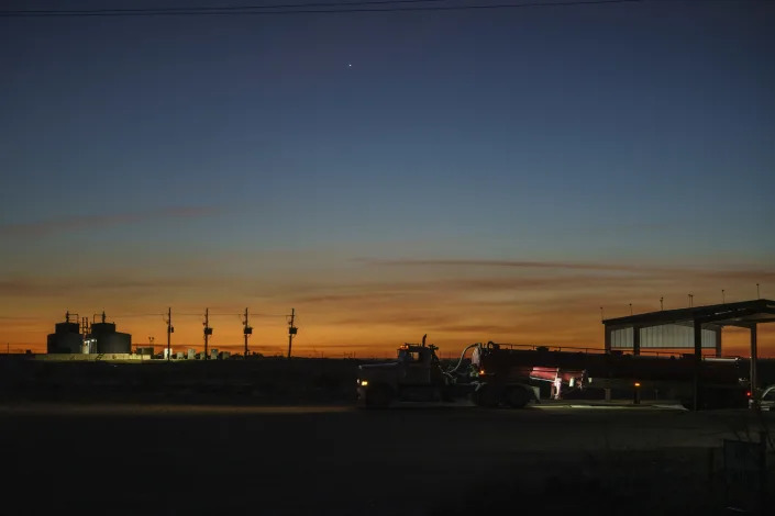 A truck disposes of wastewater from fracking near Pecos, Texas on Jan. 13, 2023. (Paul Ratje/The New York Times)