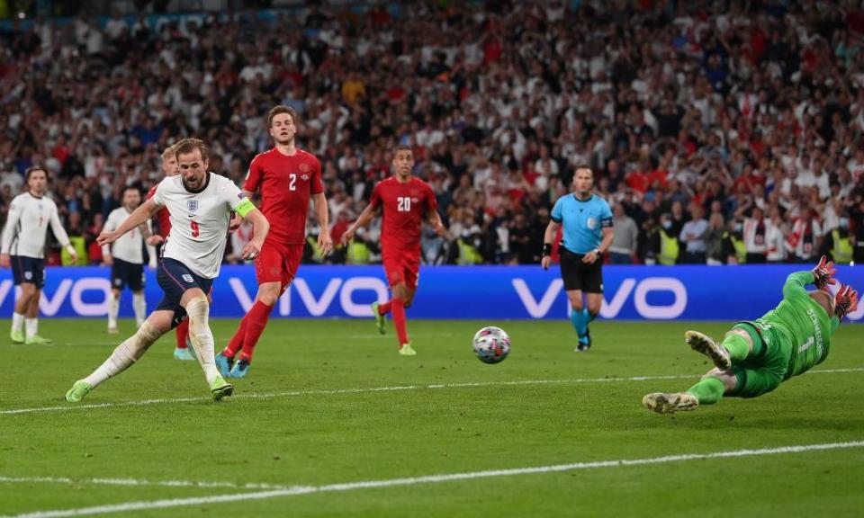 Harry Kane scores from the rebound for the winner in extra time after seeing his penalty saved by Kasper Schmeichel.