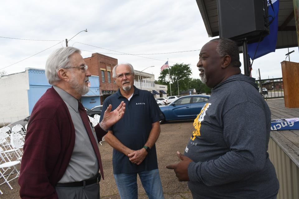 The Rev. Avery Hamilton (right), a descendant of Jesse McKinney, a victim of the Colfax Massacre, talks with Jerry F. Hickman (left) and Dean Woods who are descendants of a couple of the men who perpetrated the massacre that killed 60-80 Black men on Easter Sunday in 1873.