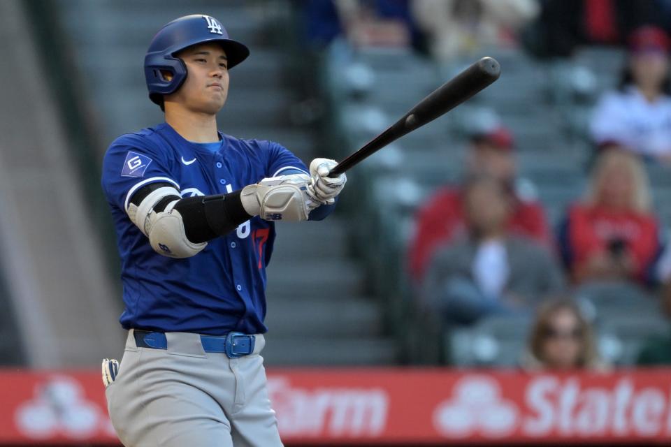 Los Angeles Dodgers designated hitter Shohei Ohtani (17) strikes out in the first inning against the Los Angeles Angels at Angel Stadium.