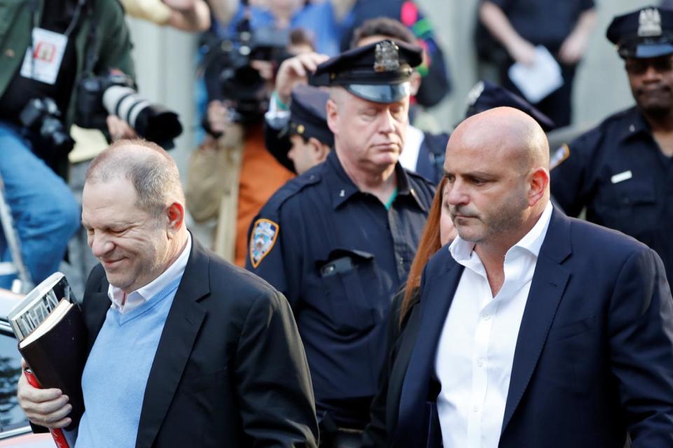 Charges: Weinstein arriving at the police station in NYC (Reuters)