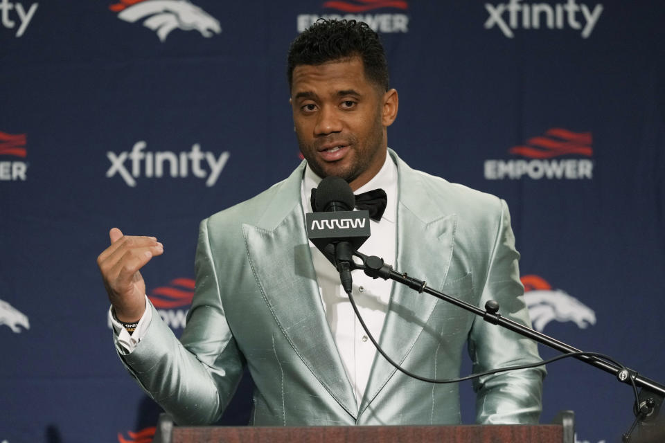 Denver Broncos quarterback Russell Wilson talks to reporters at a press conference after an NFL football game against the Seattle Seahawks, Monday, Sept. 12, 2022, in Seattle. The Seahawks won 17-16. (AP Photo/Stephen Brashear)