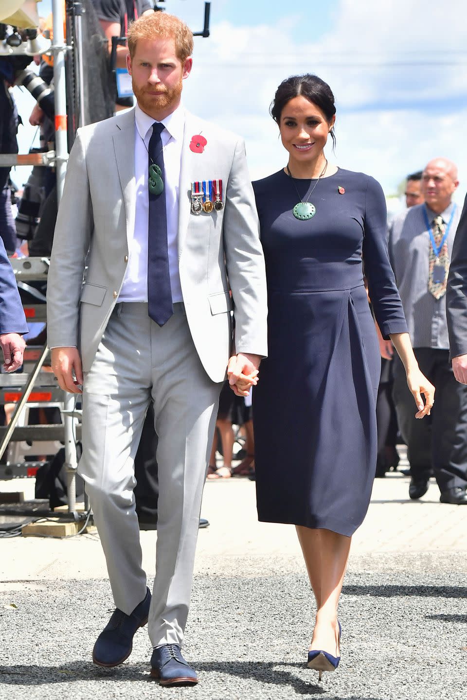 <p><strong>31 October</strong> For a visit to the Kiwi Encounter, Harry wore a grey suit while Meghan opted for a navy Stella McCartney dress.</p>