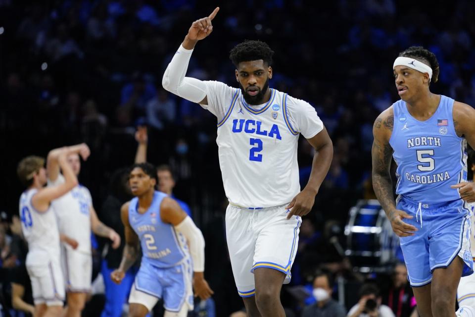 UCLA's Cody Riley reacts and runs up the court during a game against North Carolina