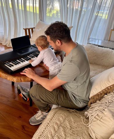 <p>Michael Buble Instagram</p> Michael Bublé and Cielo on the piano