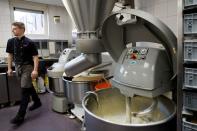 An employee prepares bread at a bakery in Hoevelaken