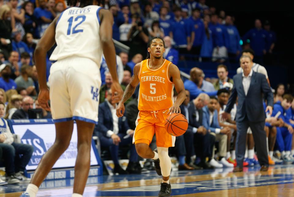 Tennessee’s Zakai Zeigler brings the ball upcourt against Kentucky on Saturday night. Zeigler scored a team-high-tying 26 points.