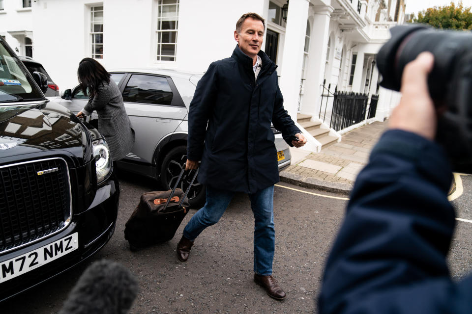 Jeremy Hunt arrives at his home in London after he was appointed Chancellor of the Exchequer following the resignation of Kwasi Kwarteng. 